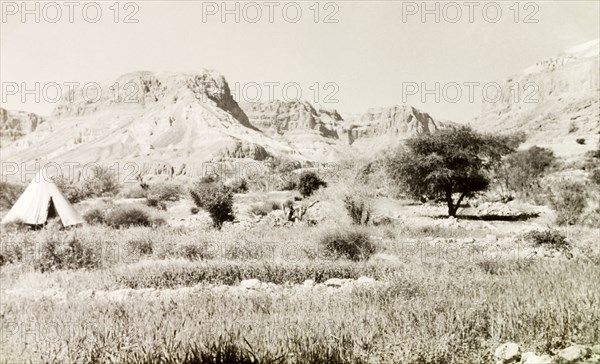 A bell tent at Ein Gedi. A lone bell tent is pitched at Ein Gedi (Engedi), a freshwater oasis located on the western shore of the Dead Sea. Ein Gedi, British Mandate of Palestine (West Bank, Middle East), 2-9 April 1941. Ein Gedi, West Bank, West Bank (Palestine), Middle East, Asia.