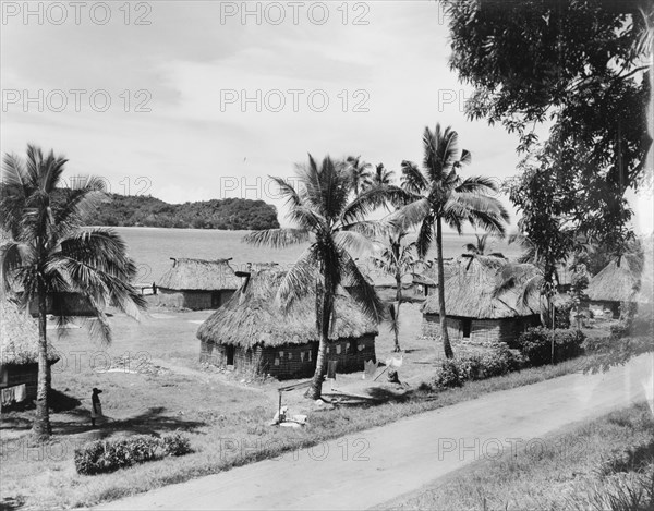 Naboutini village on Viti Levu. The village of Naboutini, comprising several Fijian 'bures' (dwellings), is situated between the Queen's Road running from Nadi to Suva and Somo Bay. Viti Levu, Fiji, 1965., Viti Levu, Fiji, Pacific Ocean, Oceania.