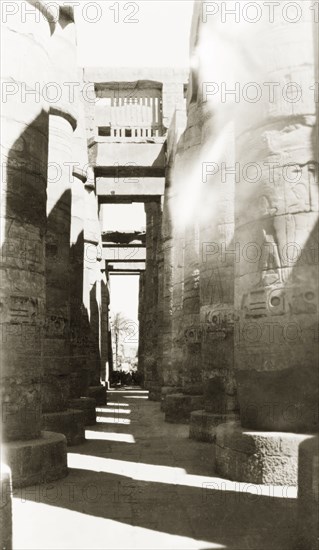 Columns of the Great Hypostyle Hall. An avenue of stone columns at the Great Hypostyle Hall, located within the Karnak Temple complex. Karnak, Egypt, February 1945., Qina, Egypt, Northern Africa, Africa.