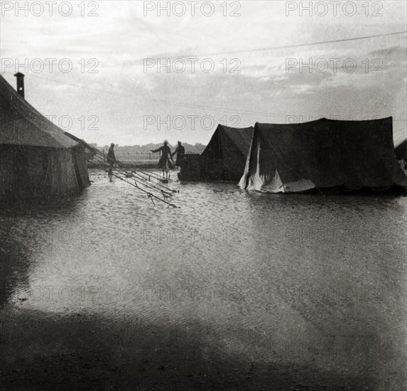 Flood at an Indian Police camp. Flooded tents at the camp of James Ferguson, Indian Police, sit in several inches of water after a heavy storm. United Provinces (Uttar Pradesh), India, 1936., Uttar Pradesh, India, Southern Asia, Asia.
