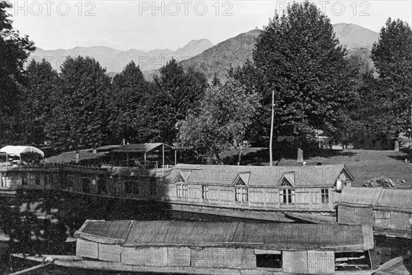 Shikaras on Lake Dal. Shikaras (houseboats) moored at Chenar Bagh. Srinagar, Jammu and Kashmir, India, May 1934. Srinagar, Jammu and Kashmir, India, Southern Asia, Asia.