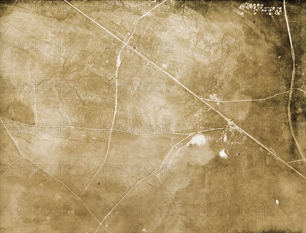 Le Sars and the Butte de Warlencourt, 1918. One of a series of British aerial reconnaissance photographs recording the positions of trenches on the Western Front during the First World War. An original caption identifies the village of Le Sars (top middle) and the Butte de Warlencourt (right of centre), an ancient burial ground located on the old roman road running from Albert to Bapaume. Le Sars, Nord-Pas de Calais, France, 18 March 1918. Le Sars, Nord-Pas de Calais, France, Western Europe, Europe .