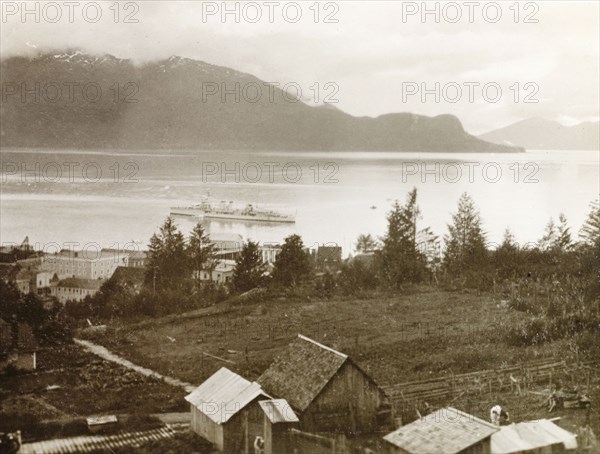 View of Elephant Point, Alaska. View of Elephant Point on Woronofski Island, taken from high ground on Wrangell Island. The HMS Dauntless can be seen anchored in the waters of the Zimovia Strait. Wrangell, Alaska, United States of America, circa 1931. Wrangell, Alaska, United States of America, North America, North America .