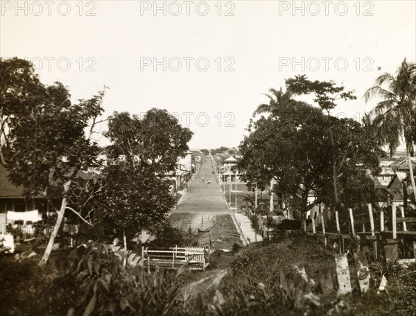 Main street of Limon. View along the wide main street that runs through the centre of Limon. Limon, Costa Rica, circa 1931. Limon, Limon, Costa Rica, Central America, North America .