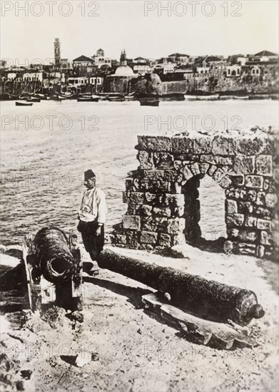 Cannon outpost at the Bay of Acre. A cannon outpost overlooks the Bay of Acre. Acre (Akko), British Mandate of Palestine (Northern Israel), circa 1938. Akko, North (Israel), Israel, Middle East, Asia.