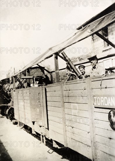 Railway guard carriage, Palestine. British soldiers armed with light mortar travel inside a railway guard carriage, protected by overhead shields. During the period of the Great Uprising (1936-39), an additional 20,000 British troops were deployed to Palestine in an attempt to clamp down on Arab dissidence. British Mandate of Palestine (Middle East), circa 1938. Jordan, Middle East, Asia.
