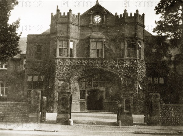 School House at Eastbourne College. The arched gateway and facade of School House at Eastbourne College. Eastbourne, England, circa 1923. Eastbourne, Sussex, England (United Kingdom), Western Europe, Europe .