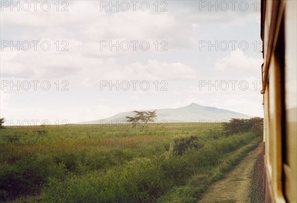 Crossing the Kenya highlands. View of the Kenyan highlands, taken from a Uganda Railways train travelling from Kampala to Mombasa. West Kenya, April 1964., West (Kenya), Kenya, Eastern Africa, Africa.