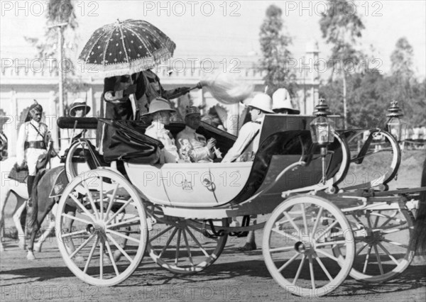 Nawab Station to Khasbag Palace. The Nawab of Rampur and Sir Maurice Hallett drive in a carriage procession from Nawab Station to the Khasbag Palace Rampur accompanied by an escort of the Rampur Lancers. Ramour, United Provinces (Uttar Pradesh), India, 10 April 1940, .