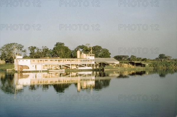 Paddle steamer at Atura. A rear-wheel paddle steamer on the River Nile. Atura, East Uganda, 1959., East (Uganda), Uganda, Eastern Africa, Africa.