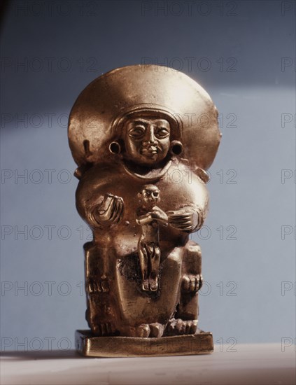A pendant in the form of a seated goddess, probably representing the Sun Goddess of Arinna,Queen of the Land of Hatti, Queen of Heaven and Earth