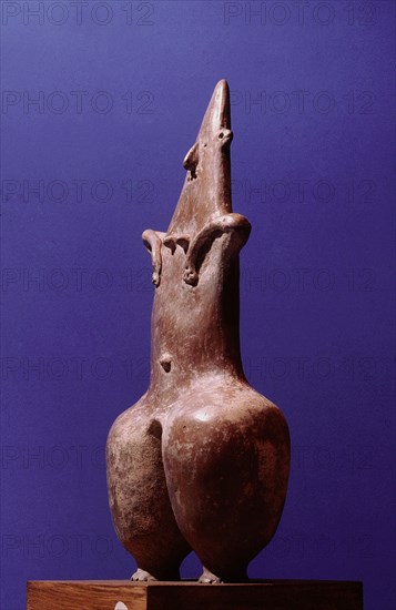 A mother goddess / fertility figure with emphasized hips and navel