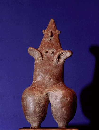 A mother goddess / fertility figure with emphasized hips and navel