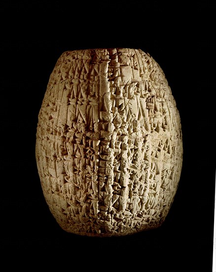 Hollow clay cylinder inscribed in cuneiform, describing Sin iddinams dredging of the Tigris on behalf of various deities