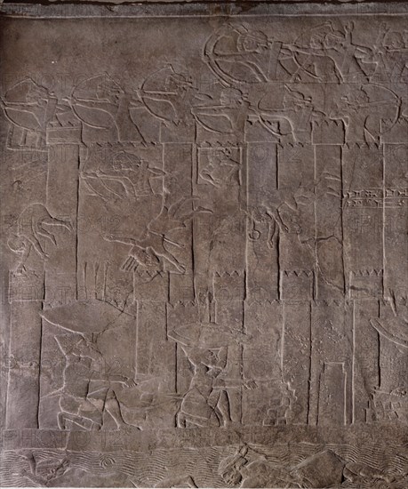 Stone relief from the palace of Ashurbanipal