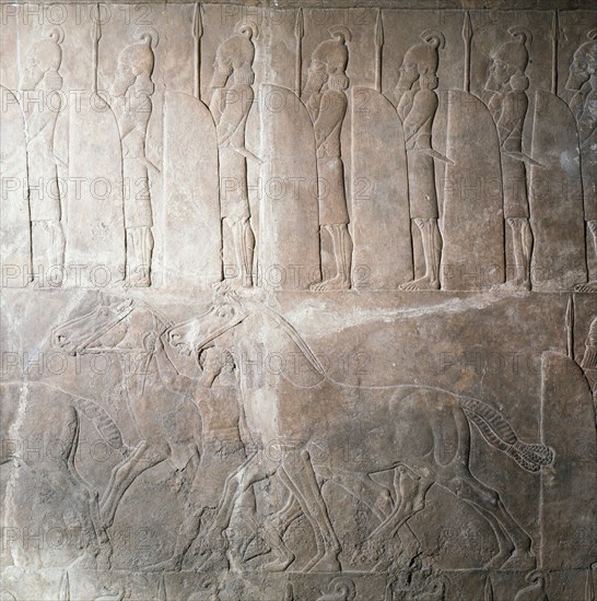 Stone relief from the palace of Ashurbanipal