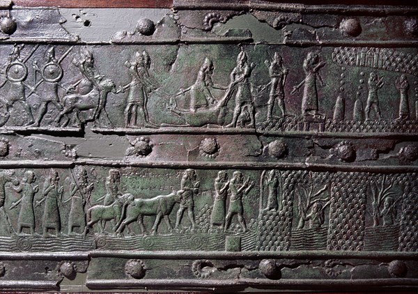 The wooden gates of Shalmaneser III with bands of relief decoration in bronze