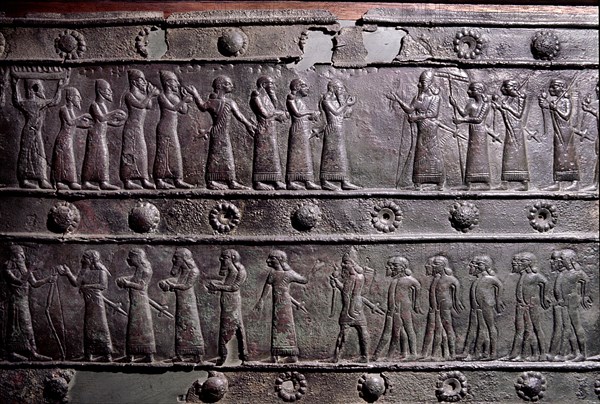 The wooden gates of Shalmaneser III with bands of relief decoration in bronze