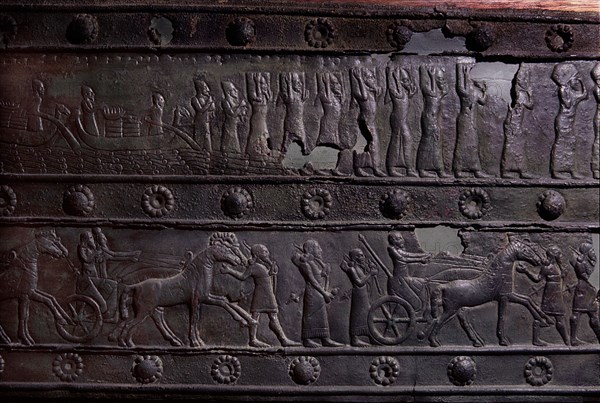 The wooden gates of Shalmaneser III with bands of relief decoration in bronze