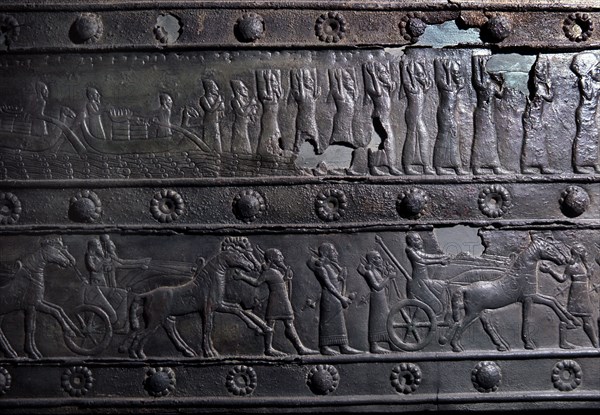 The wooden gates of Shalmaneser III with bands of relief decoration in bronze