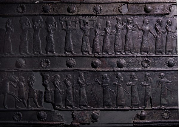 The wooden gates of Shalmaneser III with bands of relief decoration in bronze