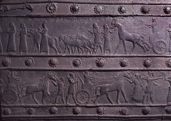 The wooden gates of Shalmaneser III with bands of relief decoration in bronze