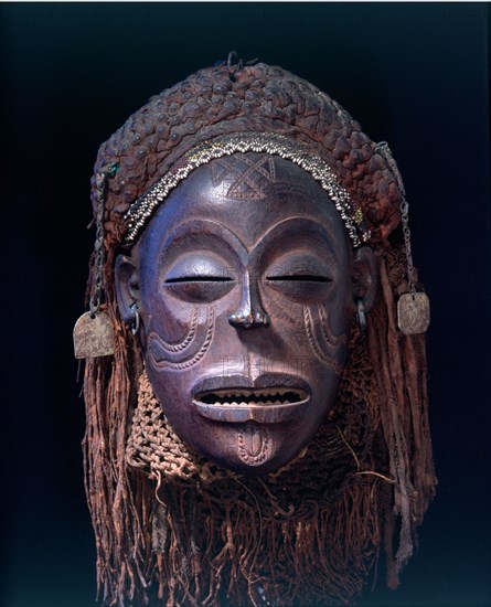 Dance mask of a type known as Mwana Pwo, regarded as an idealised depiction of a beautiful young girl, showing facial scarifications