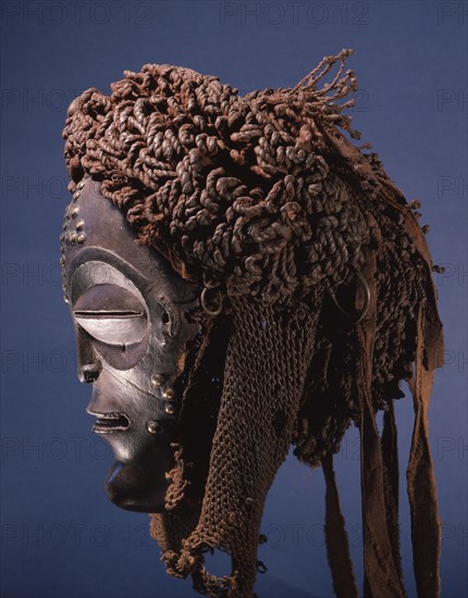Dance mask of a type known as Mwana Pwo, regarded as an idealised depiction of a beautiful young girl