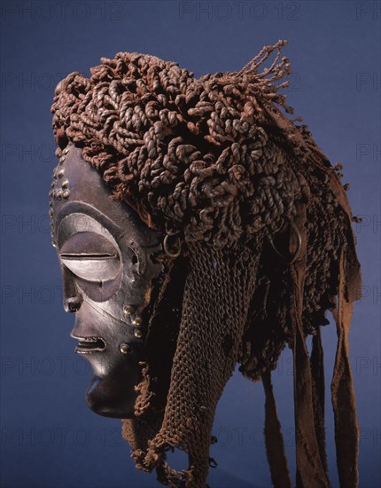 Dance mask of a type known as Mwana Pwo, regarded as an idealised depiction of a beautiful young girl