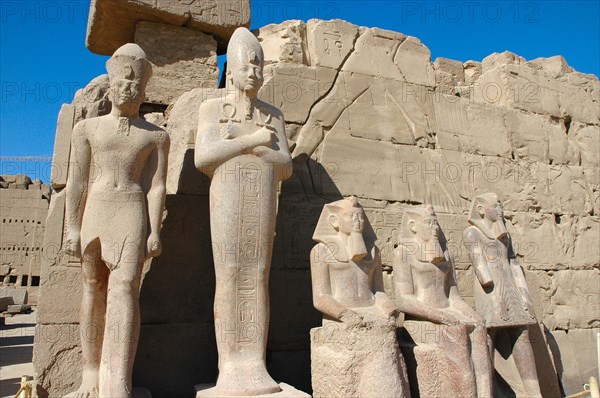 Five statues of pharaohs