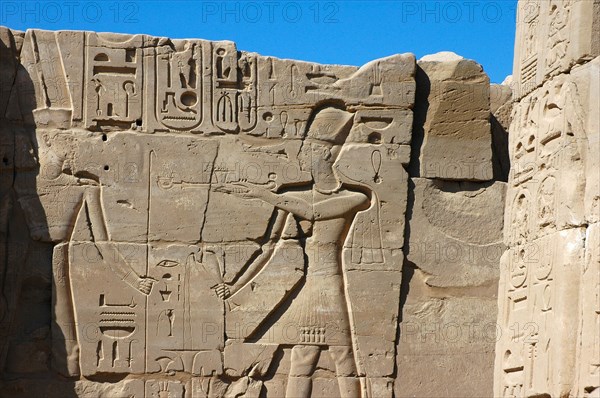 Pharaoh offering incense to Amun from the Cachette Court