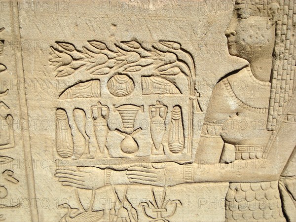 Carved relief on the outer wall of the structure which houses the Hall of the Ennead and The Sanctuary