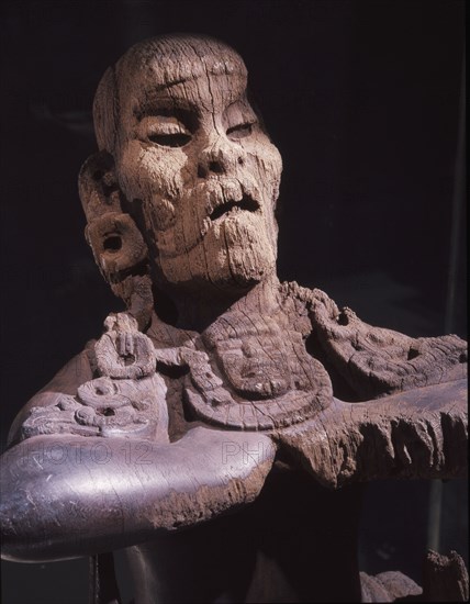 Seated figure of a man
