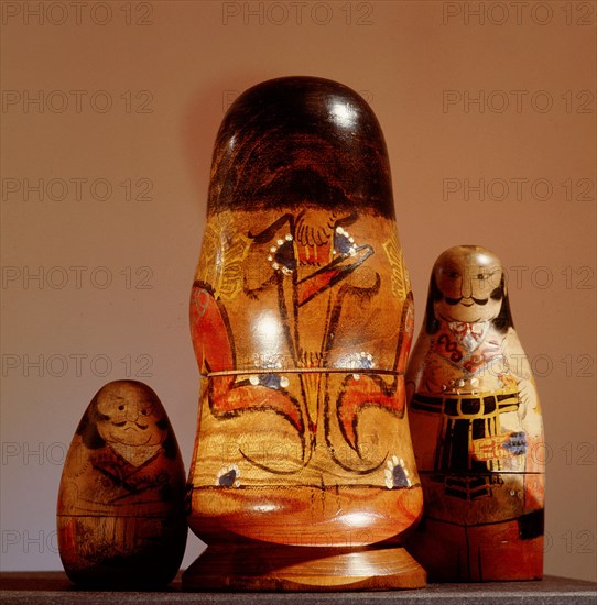 Painted wooden dolls which stack one inside the other