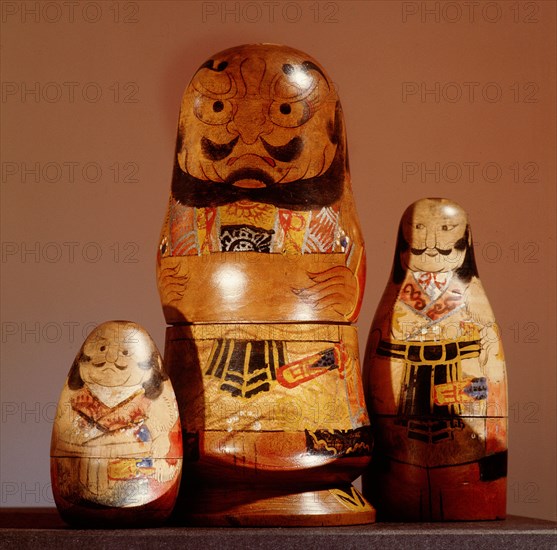 Painted wooden dolls which stack one inside the other