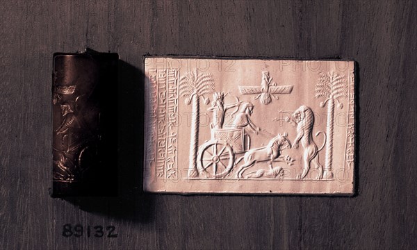 Cylinder seal and impression depicting the Great King Darius in a chariot hunting lions
