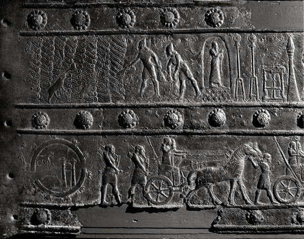 The wooden gates of Shalmaneser III with bands of relief decoration in bronze