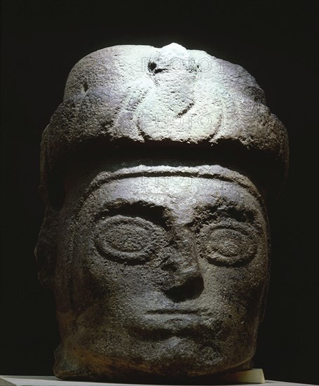 Stone head with turban like headdress