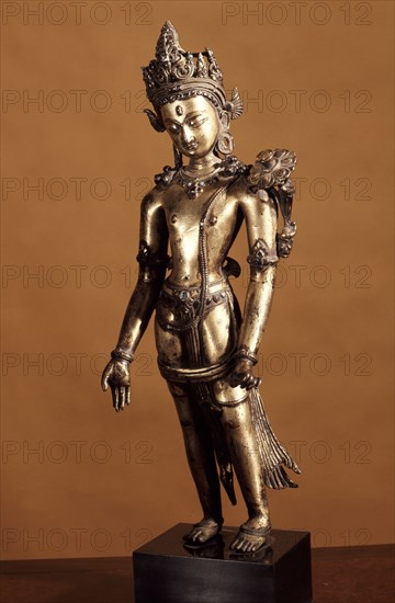 Avalokitesvara in his form of Padmapani the bearer of the lotus flower