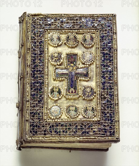 A binding of a liturgical book which is richly encrusted with enamels and pearls