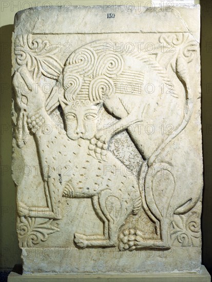 Relief carving of a lion devouring a gazelle