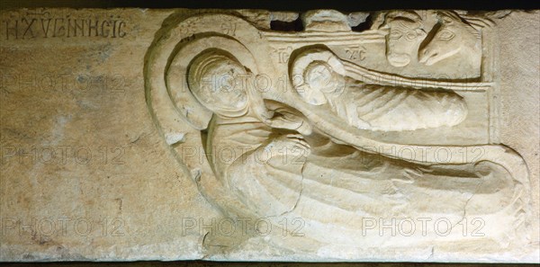 Slab with representation of the nativity scene, watched by animals