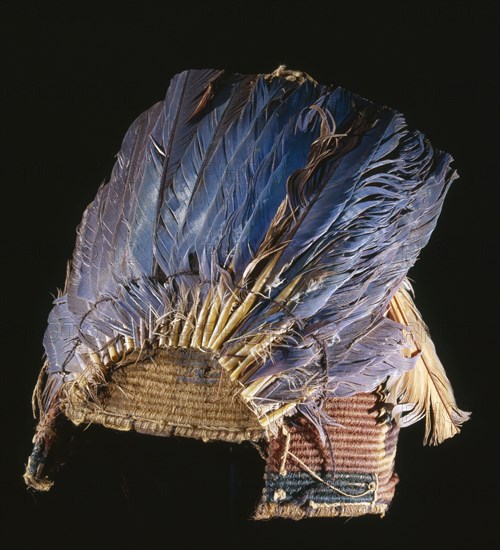 Fez style hat with feather plumes