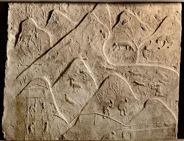 Brick from a tomb structure impressed with design of hills with a hunting scene and peasants gathering wood