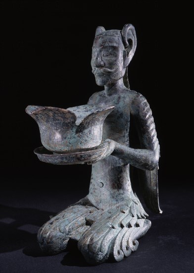 Archaic candelabra depicting a xian