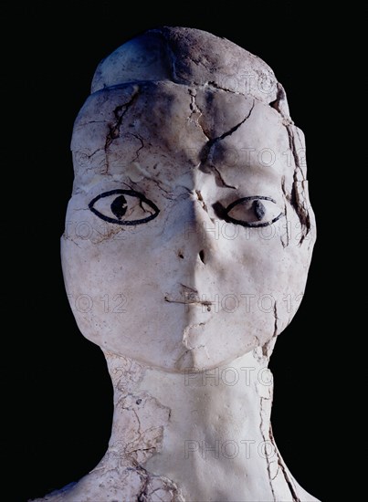 Anthropomorphic statue one of several found buried in pits in the vicinity of Ain Ghazal