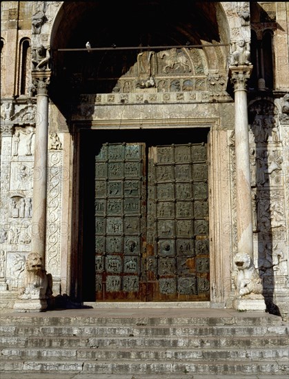 Detail of the facade of the Basilica of San Zeno, Verona, showing the bronze door