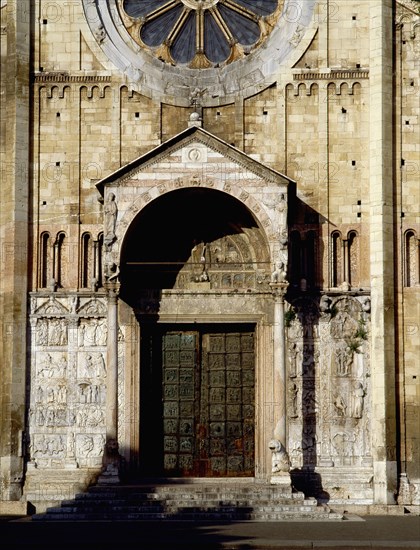 Detail of the facade of the Basilica of San Zeno, Verona, showing the bronze door