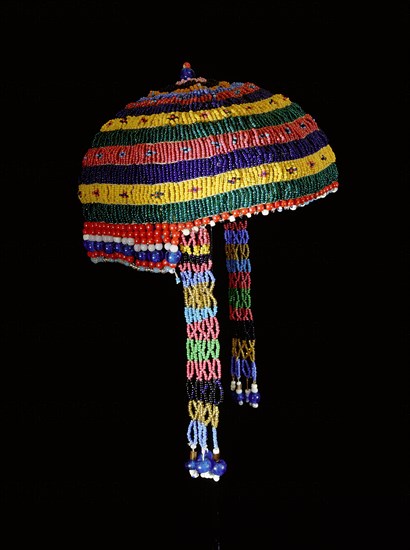 Beaded dance headdress worn by Alaskan eskimo women in the C19th, illustrating the wealth amassed from trade as contacts with Europeans increased