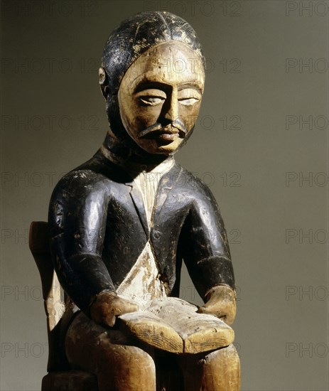 This figure of a man reading a book is believed to depict a Swedish or Swiss missionary